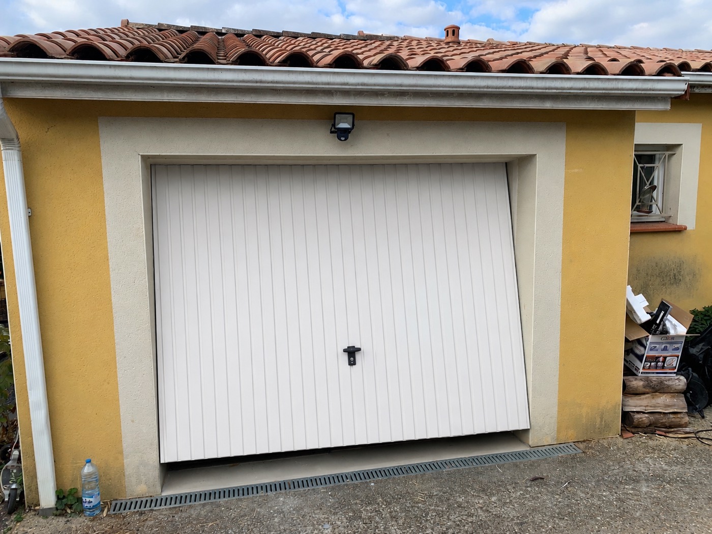 Avant : porte de garage d'origine
